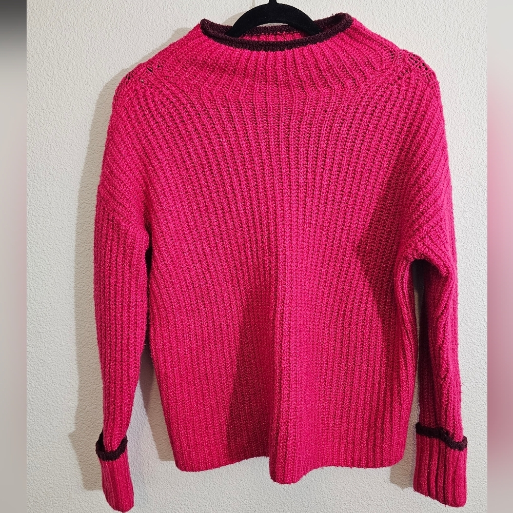 Maeve by Anthropologie Carys Mock-Neck Sweater in a vibrant raspberry pink hue.